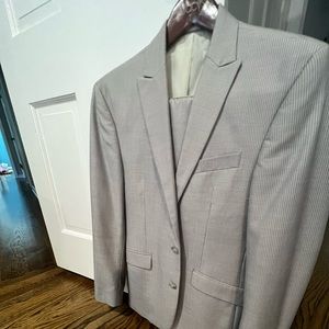 Kenneth Cole 38R 31W gray suit with white pinstripes. Worn once.